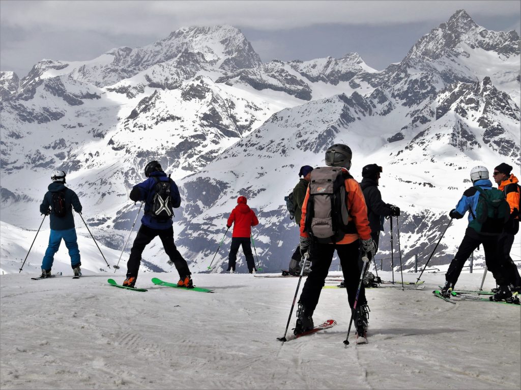 Skiers at the top of the mountain